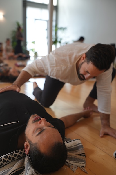 Eric facilitating a group breathwork session